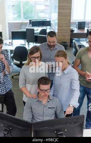 startup business people group working as team to find  solution Stock Photo