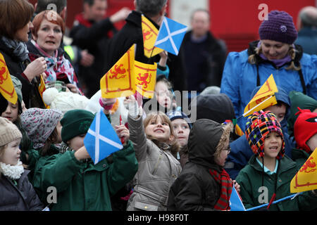 Children waving Scottish flags Stock Photo