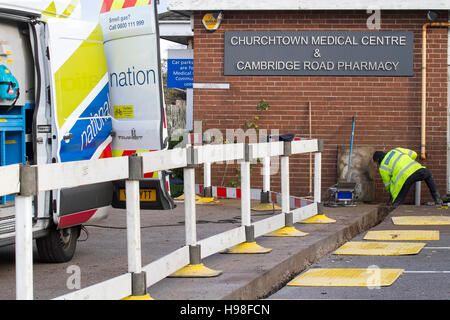 National Grid vans attending to emergency gas leak, Southport, UK Stock