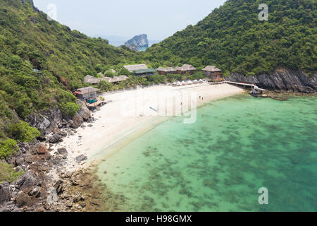 Monkey island resort on this small beach on monkey island, Cat Ba National Park, Lan Ha Bay,Halong Bay, Vietnam Stock Photo