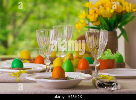 Happy Easter! Serving for the Easter table, in the yellow decor. Stock Photo