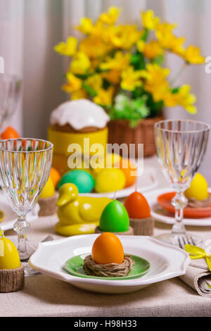 Happy Easter! Serving for the Easter table, in the yellow decor. Stock Photo