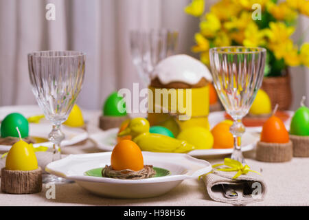 Happy Easter! Serving for the Easter table, in the yellow decor. Stock Photo
