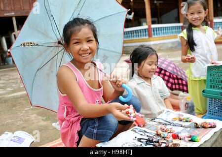 Lao children in Luang Prabang in Laos. Stock Photo