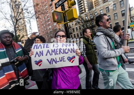 New York, USA. 19th November, 2016. Anti Trump protesters from Queens, the most diverse borough in New York City and childhood home of Donald Trump, march across the Queensboro Bridge to protest outside Trump Tower. The march was organized by City Councilmember Jimmy van Bramer ©Stacy Walsh Rosenstock Stock Photo