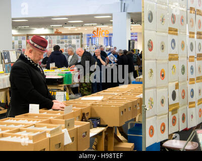 Olympia West, London, UK. 19th Nov, 2016. Vintage Record Collector browsing a stall at the Musicmania record fair at Olympia West London UK. 19/11/2016 Credit:  Martyn Goddard/Alamy Live News Stock Photo