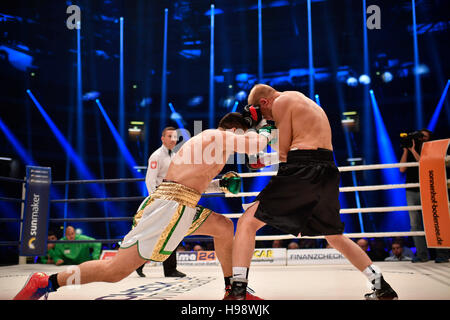 Hanover, Germany. 19th Nov, 2016. IBO World Champion Marco Huck (l) and Dmitro Kutscher from Ukraine in action during the IBO Cruiserweight Championship at TUI-Arena in Hanover, Germany, 19 November 2016. PHOTO: ALEXANDER KOERNER/dpa/Alamy Live News Stock Photo