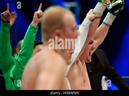 Hanover, Germany. 19th Nov, 2016. IBO World Champion Marco Huck (r) wins against Dmitro Kutscher from Ukraine during the IBO Cruiserweight Championship at TUI-Arena in Hanover, Germany, 19 November 2016. PHOTO: ALEXANDER KOERNER/dpa/Alamy Live News Stock Photo