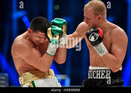 Hanover, Germany. 19th Nov, 2016. IBO World Champion Marco Huck (l) and Dmitro Kutscher from Ukraine in action during the IBO Cruiserweight Championship at TUI-Arena in Hanover, Germany, 19 November 2016. PHOTO: ALEXANDER KOERNER/dpa/Alamy Live News Stock Photo