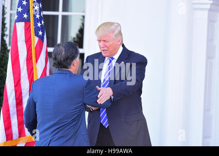 Bedminster, United States. 19th Nov, 2016. President elect Donald Trump greet erstwhile rival & critic, former Massachusetts governor, Mitt Romney after his arrival at Trump's Bedminster, New Jersey country club. Credit:  Andy Katz/Pacific Press/Alamy Live News Stock Photo