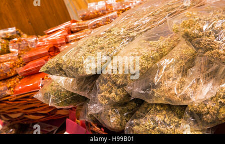 bags with dried oregano on sale in the italian stall in Sicily Stock Photo