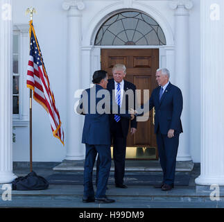 President elect Donald Trump and Vice President elect Mike Pence greet Mitt Romney at the clubhouse at Trump International Golf Club, November 19, 2016 in Bedminster Township, New Jersey. (Aude Guerrucci / Pool) *** Please Use Credit from Credit Field *** Stock Photo