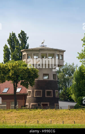 Germany,  Ruhr area, Voerde, house Storchennest at the river Rhine in Goetterswickerhamm, old mill tower today an out-look. Stock Photo