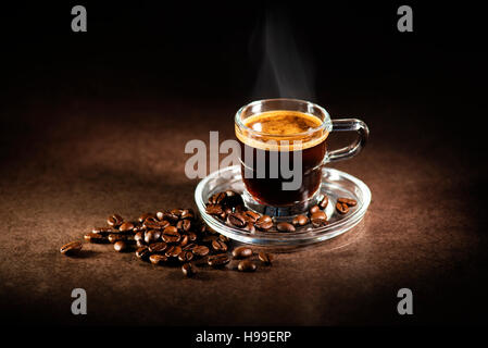 Cup of espresso coffee on dark background. Stock Photo