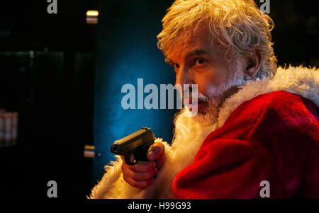 Bad Santa 2 is a 2016 American Christmas black comedy crime film directed by Mark Waters and written by Shauna Cross and Johnny Rosenthal. A sequel to the 2003 film Bad Santa, the film stars Billy Bob Thornton, Tony Cox, Brett Kelly, Kathy Bates and Christina Hendricks.  This photograph is for editorial use only and is the copyright of the film company and/or the photographer assigned by the film or production company and can only be reproduced by publications in conjunction with the promotion of the above Film. A Mandatory Credit to the film company is required. The Photographer should also b Stock Photo