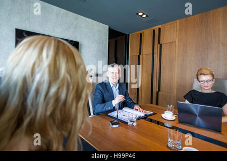 Business people having a meeting in conference room Stock Photo