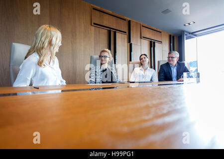 Business people having a meeting in board room Stock Photo