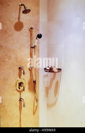 Gold plated shower in a room in the Emirates Palace Hotel Stock Photo