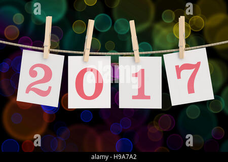 2017 Concept. Clipped cards and lights background, 3D rendering Stock Photo