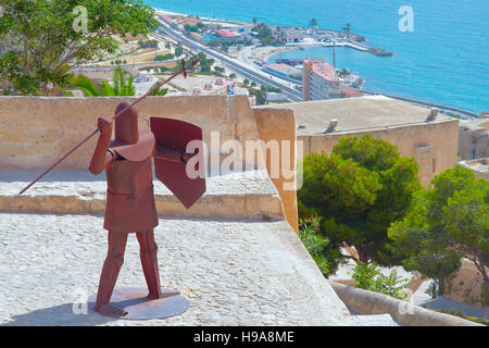 ALICANTE, SPAIN - AUGUST 31: figure of a warrior of metal in the castle of santa barbara with the coast in the background. Picture taken on August 31, Stock Photo