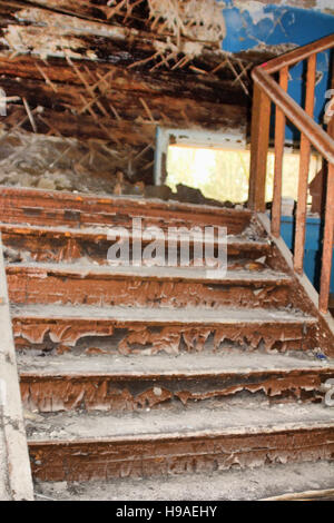 very old dilapidated dangerously unstable crumbling house Stock Photo