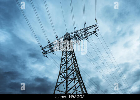 Power transmission high voltage with dramatic blue sky with clouds ...