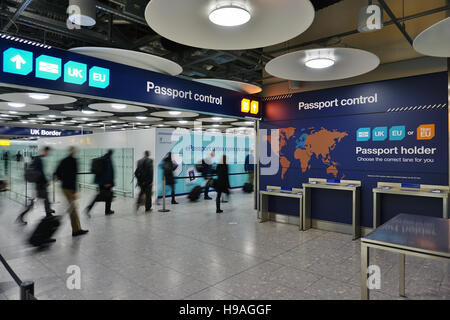 The UK and European separate passport control and immigration lanes at London Heathrow International Airport (LHR) Stock Photo