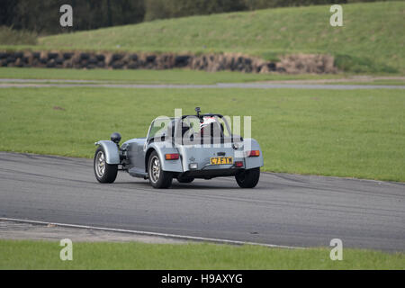 PEMBREY MOTOR CIRCUIT, CARMARTHENSHIRE, UNITED KINGDOM. OCTOBER 8 2016:   Caterham sports car races around Pembrey Circuit during a track day. Stock Photo