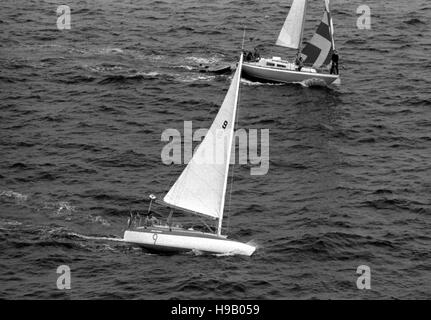 AJAXNETPHOTO. 7TH JUNE, 1980. PLYMOUTH, ENGLAND. - OSTAR 1980 - SINGLE-HANDED RACE - DREAM WEAVER  (USA) / SKIPPER : JAMES KYLE (USA) PHOTO:JONATHAN EASTLAND/AJAX  REF;800606 4 Stock Photo