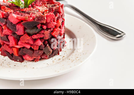 salad vinaigrette on a plate on a white background isolated close up. Stock Photo