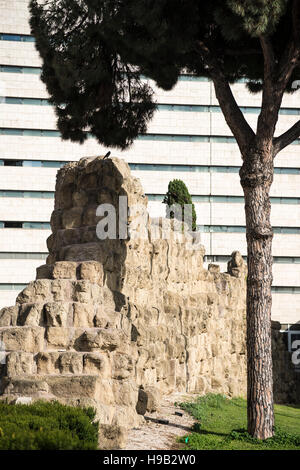 Rome. Italy. Remains of a section of the Servian Wall (4th C BC) outside Roma Termini railway station. Stock Photo