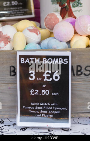 Handmade bath bombs in crate displayed with sign at handmade craft market Stock Photo