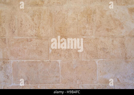 Tan stone wall texture. Stock Photo