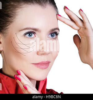 Beautiful woman with arrows on her face. Stock Photo