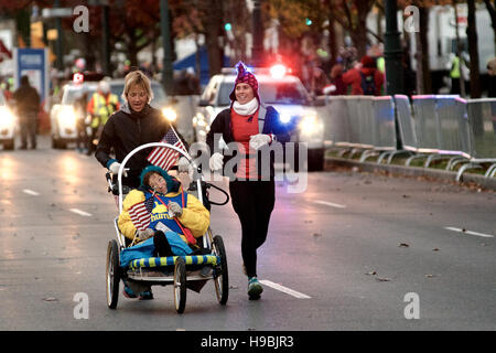 Philadelphia, Pennsylvania, USA. 20th Nov, 2016. Participants in the wheelchair and hand bike competition are sent as the sun rises over the start location of the 2016 Philadelphia Marathon, on Benjamin Franklin Parkway, on Nov. 21, 2016.  With the city of Philadelphia taking over organization the course, as well as start and finish locations are slightly different from past years. The winners for 2016 are, in the Mens race, Kimutai Cheruiyot in 2:15:53, and Taylor Ward in the Womens race in 2:36:25 Credit:  Bastiaan Slabbers/Alamy Live News Stock Photo