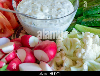 Dip sauce and vegetables on the holiday table Stock Photo