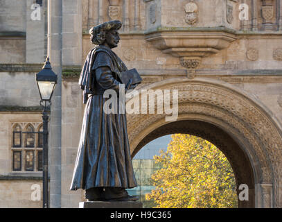 Statue of Raja Ram Mohan Roy, an Indian social reformer with a norman arch behind on College Green in Bristol Stock Photo