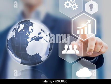 Abstract concept of business success, growth and globalization, businessman touching growing graph and 3d earth globe Stock Photo