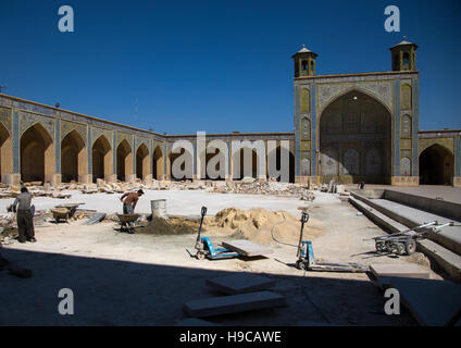 Men working for vakil mosque restoration, Fars province, Shiraz, Iran Stock Photo