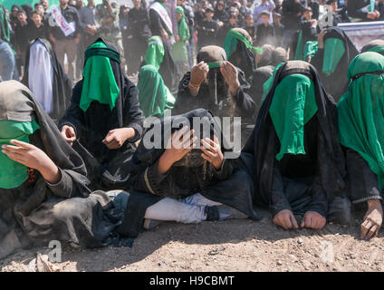 Shiite women crying during a traditional religious theatre called tazieh about imam hussein death in kerbala, Lorestan province, Khorramabad, Iran Stock Photo