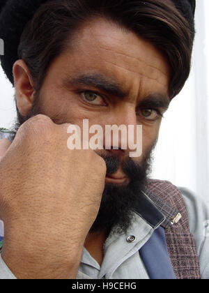 31st May 2004 Portrait of a Pashtun tribesman wearing a lungee (turban) inside the Wazir Akbar Khan Orthopaedic Centre in northern Kabul, Afghanistan. Stock Photo