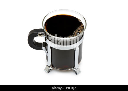 Close up of a mug in glass with dark black coffee isolated on with with clipping path Stock Photo