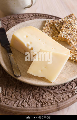 Jarlsberg a mild creamy Norwegian cheese similar to Swiss Emmental with its characteristic holes Stock Photo