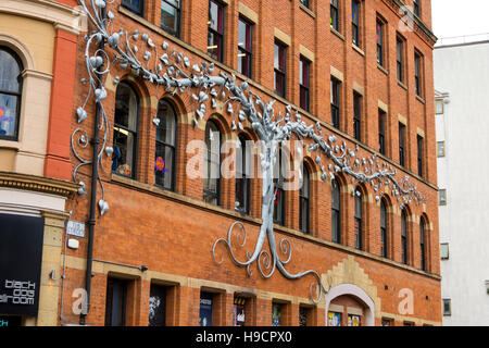 Steel tree sculpture on the side of the Affleck's store, Tib Street, Northern Quarter, Manchester, UK Stock Photo