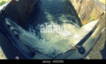 waterfall from a lock bridge on the Forth and Clyde canal, Glasgow, Scotland, UK. Stock Photo