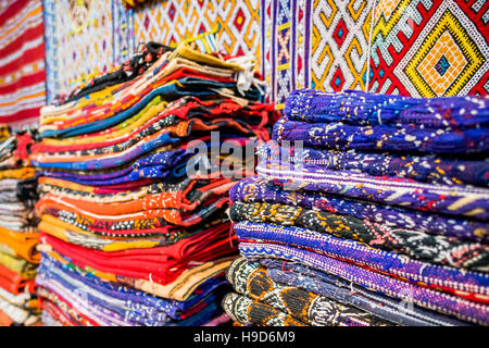 Colourful dyed rugs for sale in the souk, Marrakesh, Morocco