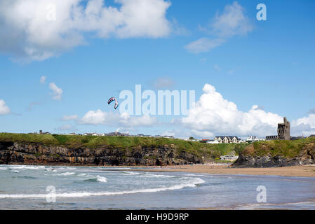 lone kite surfer surfing the waves at ballybunion beach on the wild atlantic way Stock Photo