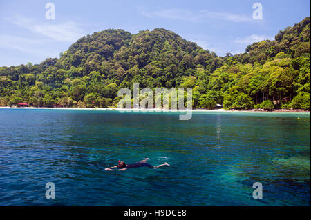 Snorkeling at Pulau Tenggol, an island off peninsular Malaysia's east coast, boasting some of the finest and most untouched beaches in Asia. Stock Photo