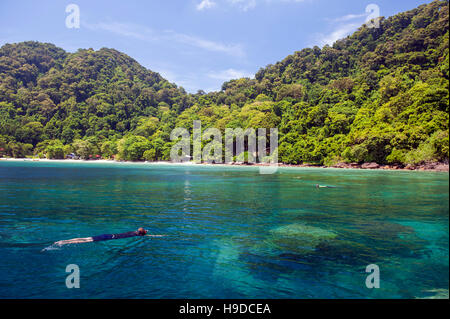 Snorkeling at Pulau Tenggol, an island off peninsular Malaysia's east coast, boasting some of the finest and most untouched beaches in Asia. Stock Photo