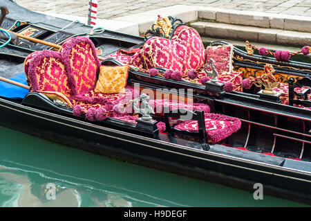 Above view of two Venetan Gondola waiting for it's passangers. Gondolas are handmade and richly decorated. Stock Photo